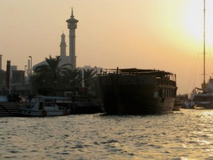 Al Bastakiya Mosque from Dubai Creek water taxi at sunset Al Bastakiya Mosque from Dubai Creek water taxi at sunset