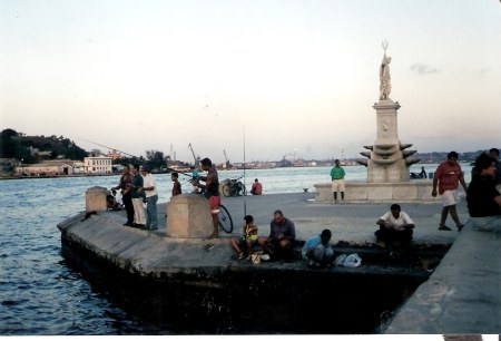 Havana-fishing-by-statue-of-Poseidon-Malecon Havana-fishing-by-statue-of-Poseidon-Malecon