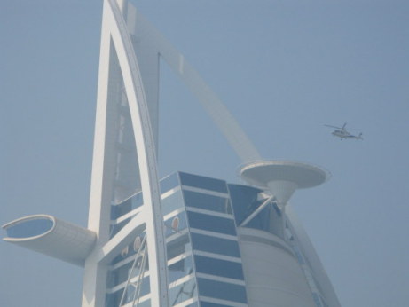 Helicopter shuttle approaching helipad at the Burj Al Arab Dubai Helicopter shuttle approaching helipad at the Burj Al Arab Dubai