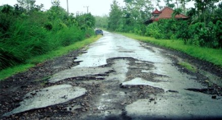 Broken road surface in Bali