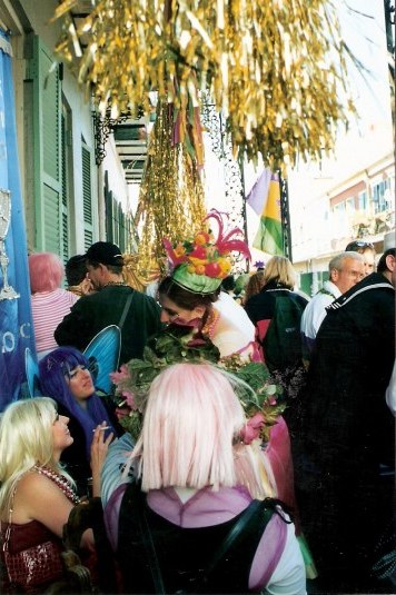 Elegant French Quarter balcony party during New Orleans Mardi Gras