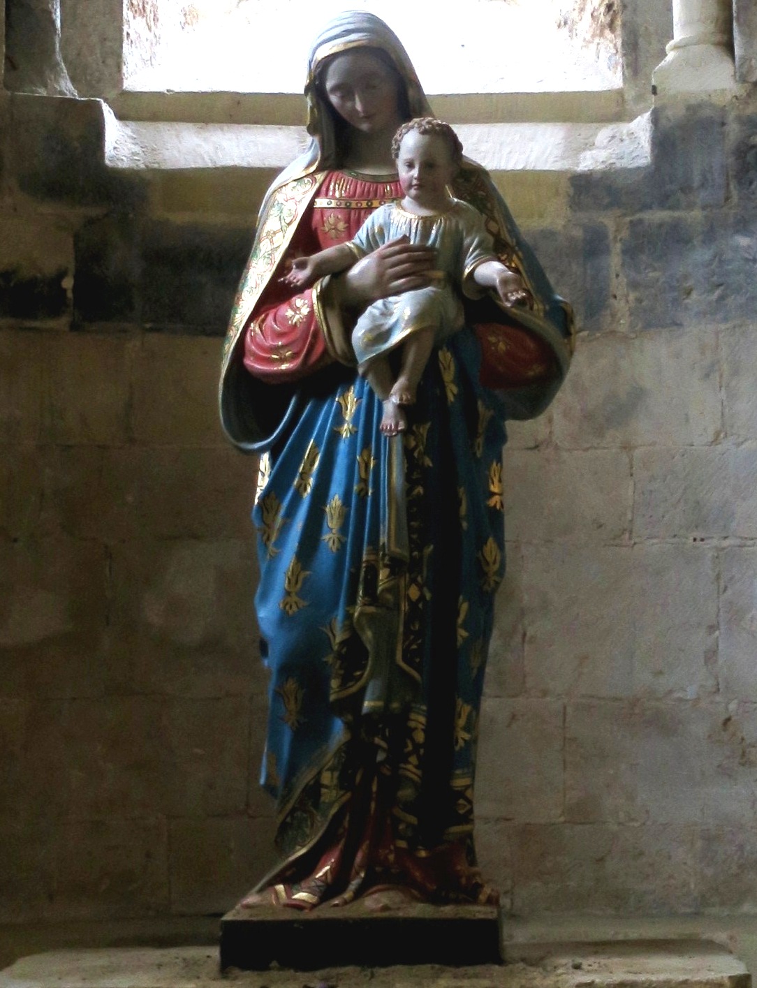 Features and detail of Holy Mother statue Cadouin Abbey Church, Dordogne, France