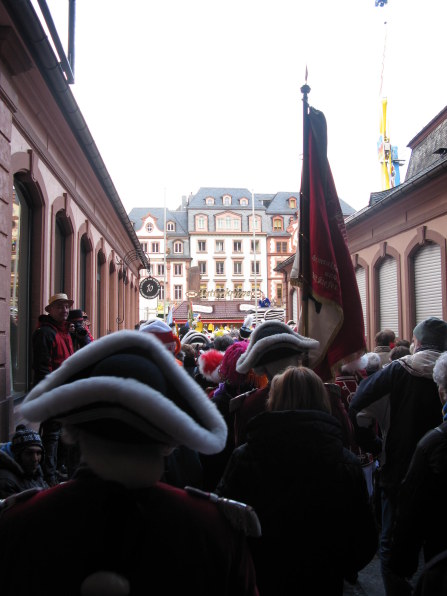 Mainz Carnival Sunday costumed worshippers leaving cathedral