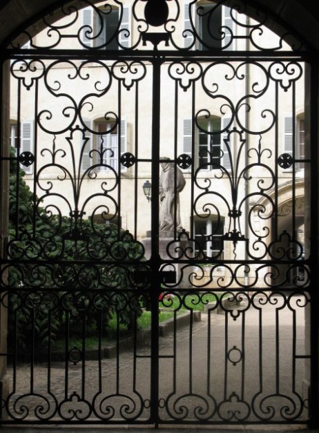 Ornamental garden gate and sculpture Hospices de Beaune