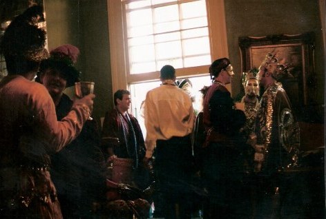 Revellers at French Quarter balcony party during New Orleans Mardi Gras