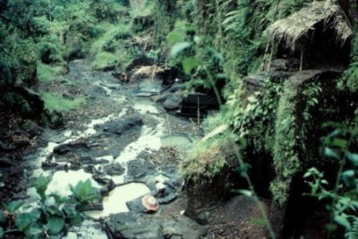 River beneath stone quarrying by hand in Bali