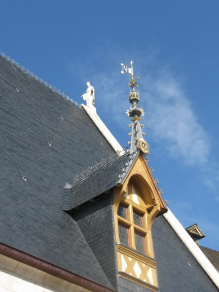 Saint on chapel roof of the Hospices de Beaune
