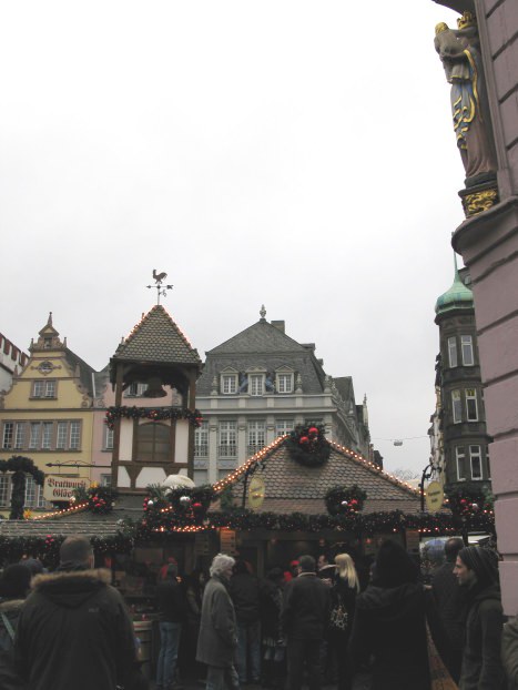 Saint overlooking Trier Christmas Market 