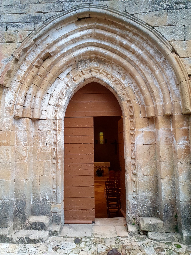 Urval, Dordogne, France –Our Lady of the Nativity church entrance Urval, Dordogne, France –Our Lady of the Nativity church entrance
