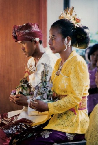 Bali village wedding offerings for bridal pair