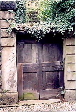 Bergamo Alta heavy door and stairway