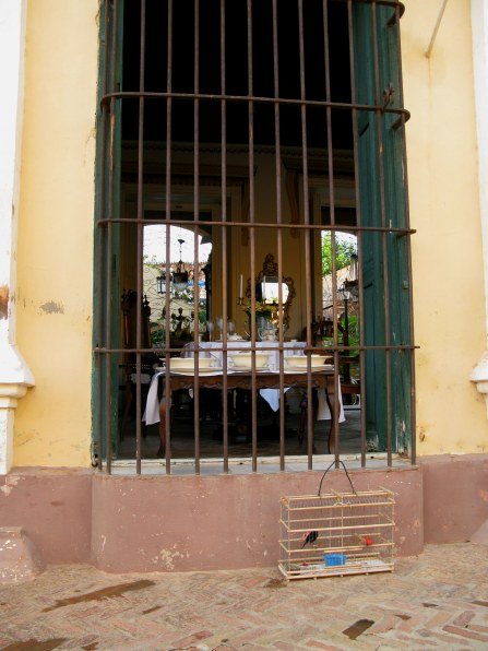 Bird cage outside shop Trinidad de Cuba