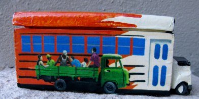 Cuban domino box with bus and truckload of people