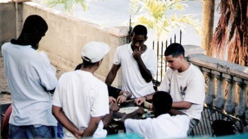 Domino game on verandah in Havana Cuba