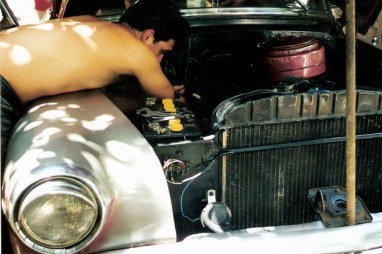 Engine repairs on classic Chevrolet - Viñales valley – Cuba