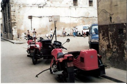 Havana Modern red motorcycles with side cars