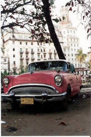 Havana-classic-red-car-on-the-Prado – Havana