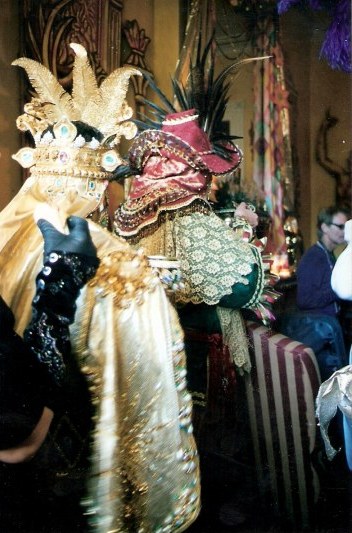 Jewelled costumes at French Quarter balcony party during New Orleans Mardi Gras