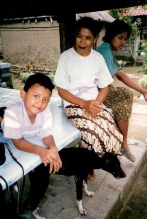 Lady with betel stained mouth in Bali