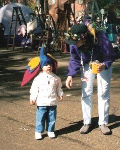 Little boy with hat along New Orleans Parade route 