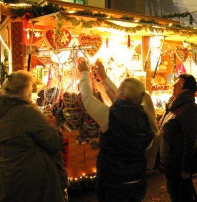 Munich Christmas Market choosing gingerbread heart