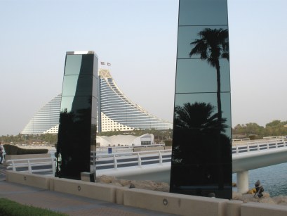 Reflections in foreground against Al Jumeirah Beach Hotel Dubai