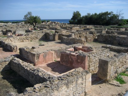 Ruins of Kerkouane houses beside the ocean in Tunisia