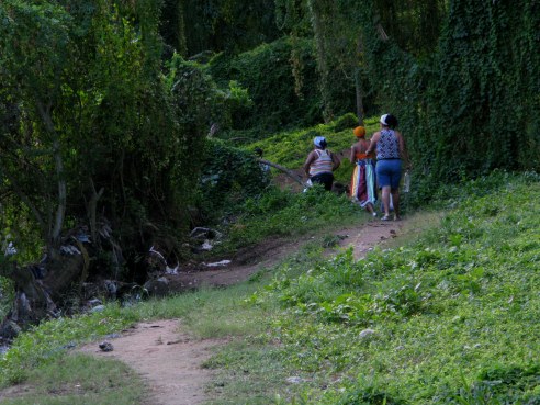 Santeria followers leaving Almendares Park Cuba