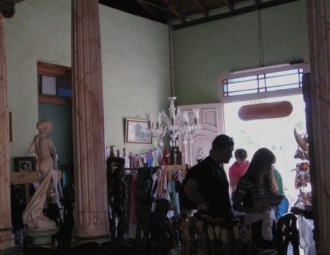 Shoppers in living room shop Trinidad de Cuba