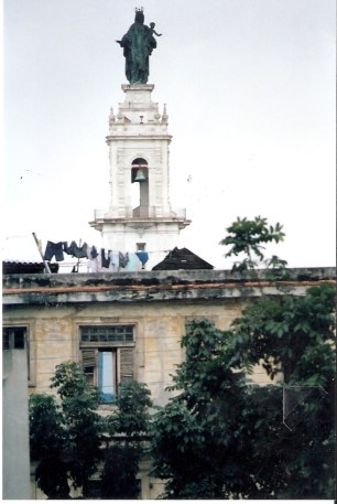 Statue of the Holy Mother in Havana with washing hanging out