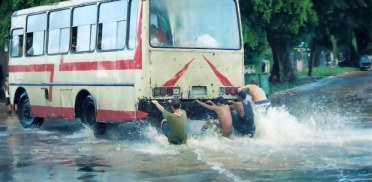 Turning a corner while street water-skiing in Havana