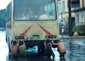 Street Water-skiing behind bus in Havana