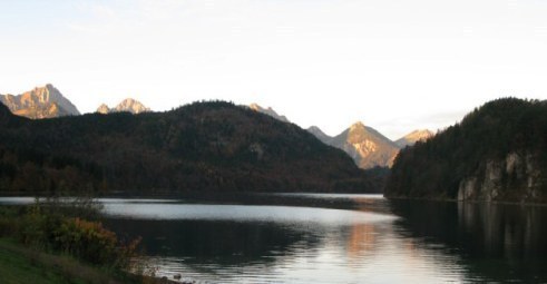 Sunrise-tipped mountains Alpsee Bavaria