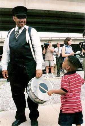 Young drummer playing Jazz Funeral New Orleans